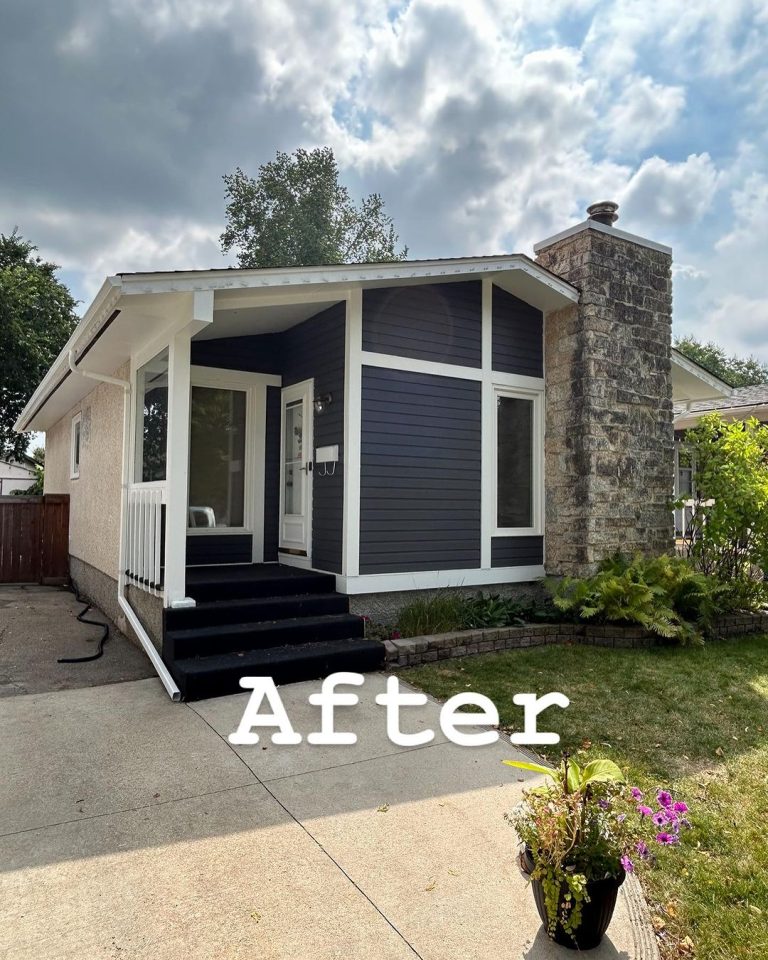 Blue House with White Trims After Being Painted